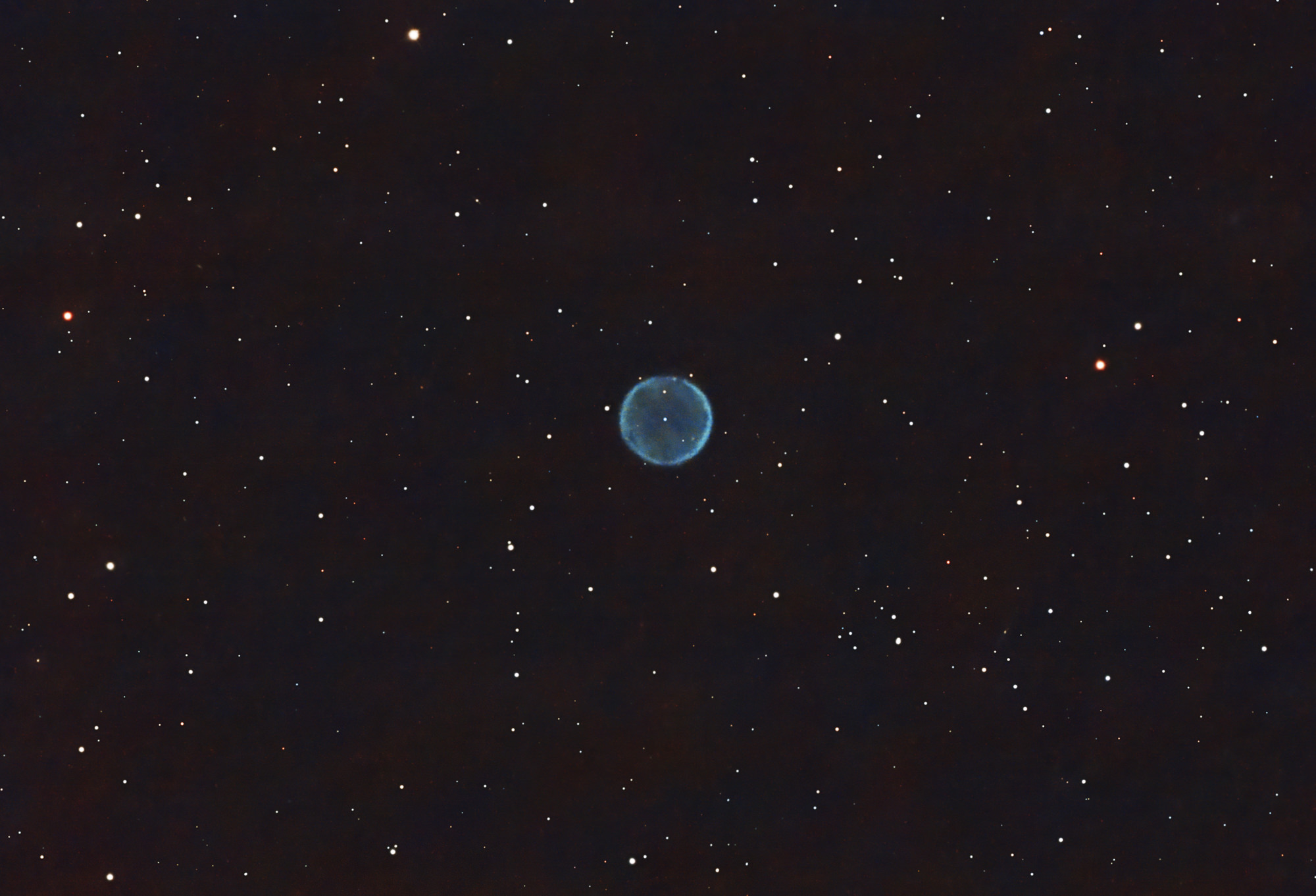 Abell 39, the 39th entry in the catalog of large nebulae discovered by George Abell in 1966, is a beautiful example of a planetary nebula.